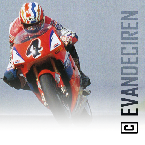 Mick Doohan on the 1994 Honda NSR500 — full throttle through the rain.